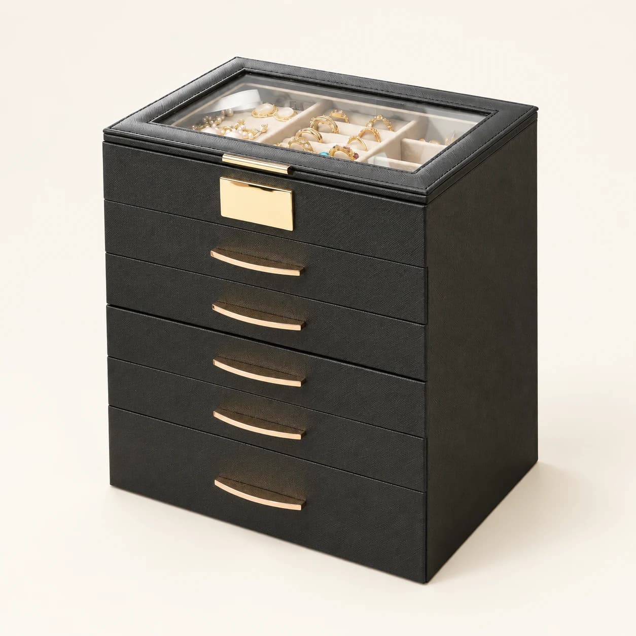 Black five-drawer jewelry organizer with a transparent lid and gold-tone handles
